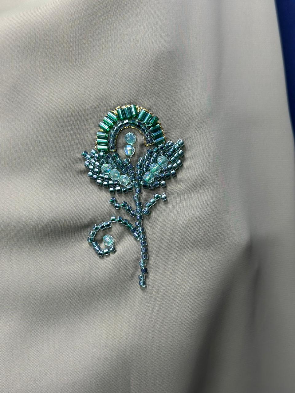 Premium beadwork embroidery detail by AL RUQIU abaya manufacturer